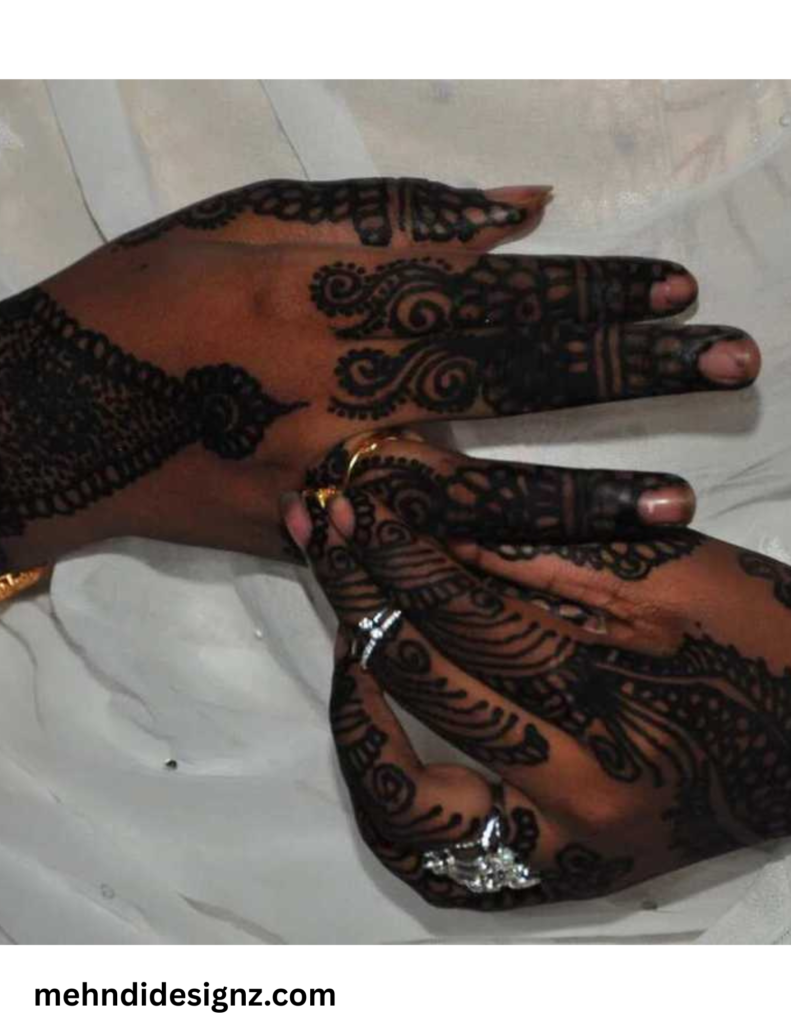 Bold geometric back hand lalle mehndi for UK Nigerian diaspora